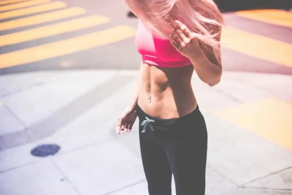 Woman with toned stomach after LA-EMS Body Sculpting Treatment Brompton